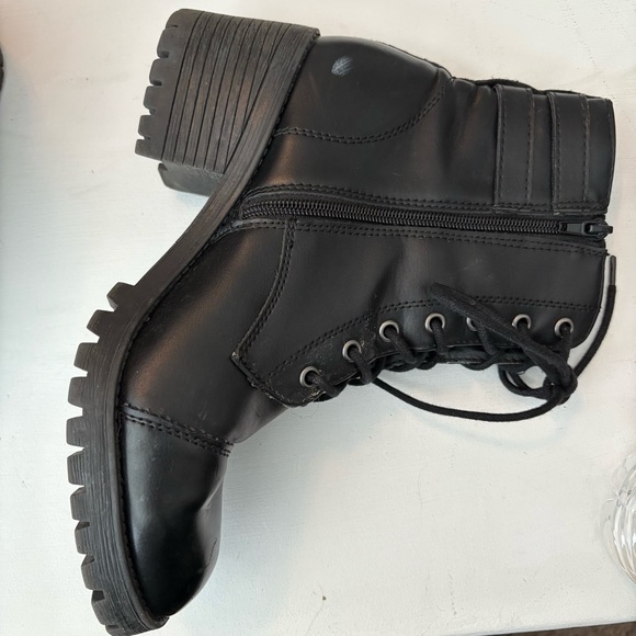Size 9.5, black Steve Madden combat bootie. Zipper sides, 2.5 in heel. - Picture 5 of 15